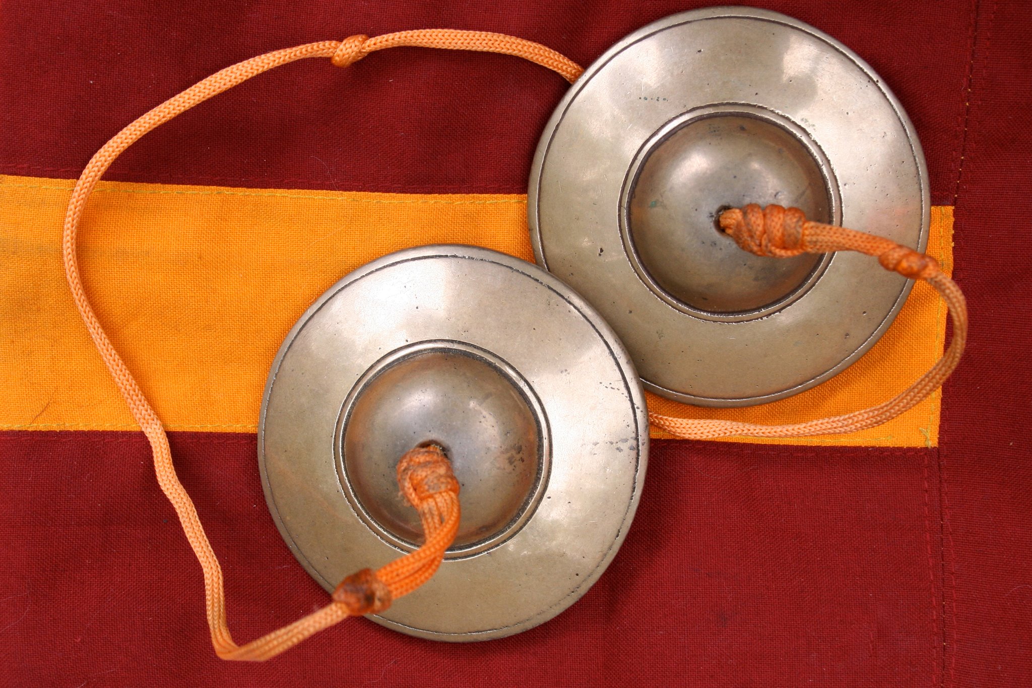 A pair of traditional Tibetan cymbals.